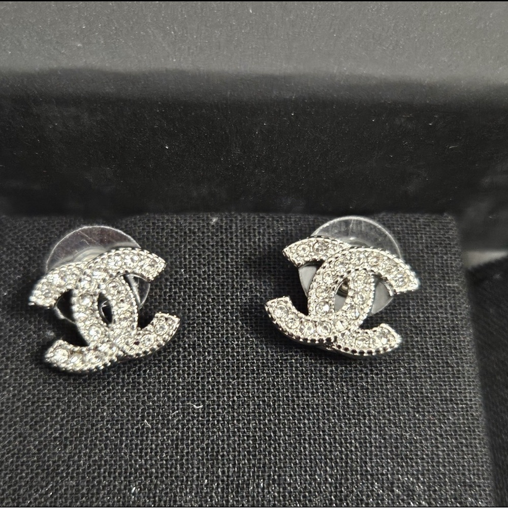 Authentic CHANEL Sparkling Silver Logo Earrings